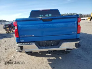 2023 Chevrolet Silverado 1500 LTZ with VIN 1GCUDGE87PZ249074, listed as a Copart auction lot 48901745 with 30,705 mi miles and Salvage Title. Bid and sale history available at DreamBid. Image 6.