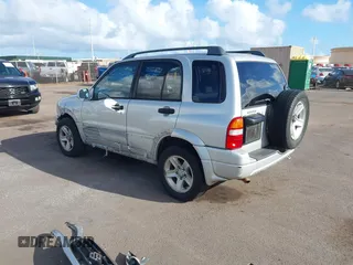 2003 Suzuki Grand Vitara z VIN JS3TE62VX34101622, wystawiony jako IAAI lot #41689760 z przebiegiem 152 104 mil mil oraz . Historia ofert i sprzedaży dostępna na DreamBid. Obrazek 3.