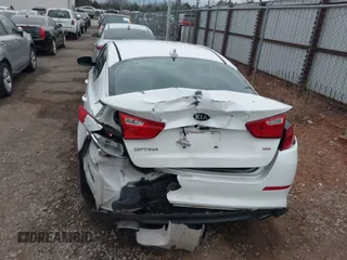 2015 Kia Optima LX with VIN KNAGM4A74F5587415, listed as a IAAI auction lot 41184428 with 128,549 mi miles. Bid and sale history available at carsss.com. Image 16.