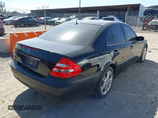 2006 Mercedes-Benz E-Class 3.5L with VIN WDBUF56J46A884099, listed as a IAAI auction lot 41798143 with 175,597 mi miles. Bid and sale history available at carsss.com. Image 4.