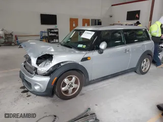 2011 MINI Cooper Clubman with VIN WMWZF3C56BT188312, listed as a IAAI auction lot 41980882 with 143,669 mi miles. Bid and sale history available at carsss.com. Image 2.