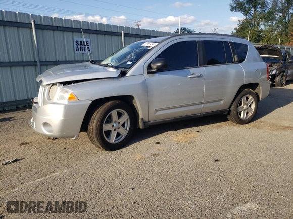 2010 Jeep Compass Sport with VIN 1J4NF4FB4AD513051, listed as a Copart auction lot 79667494 with 0 mi miles and Salvage Title. Bid and sale history available at carsss.com. Image 1.