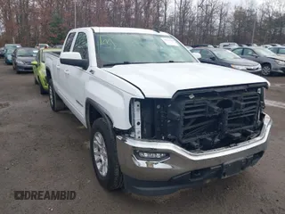 2017 GMC Sierra 1500 SLE z VIN 1GTV2MEC0HZ311932, wystawiony jako IAAI lot #40888769 z przebiegiem 72 676 mil mil oraz . Historia ofert i sprzedaży dostępna na DreamBid. Obrazek 1.