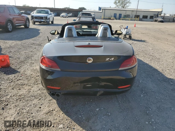 2012 BMW Z4 sDrive28i with VIN WBALL5C5XCE716711, listed as a Copart auction lot 75706534 with 89,948 mi miles and Clean Title. Bid and sale history available at carsss.com. Image 6.