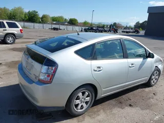 2005 Toyota Prius with VIN JTDKB20UX57054812, listed as a IAAI auction lot 42145700 with 171,163 mi miles. Bid and sale history available at carsss.com. Image 4.
