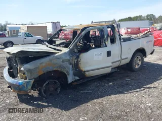 1999 Ford Super Duty F-250 XL with VIN 1FTNX21S1XEB03048, listed as a IAAI auction lot 41741521 with 1 mi miles. Bid and sale history available at carsss.com. Image 2.
