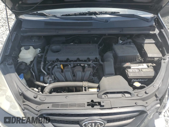 2009 Kia Rondo LX with VIN KNAFG528097250880, listed as a Copart auction lot 52632615 with 127,228 mi miles and Salvage Title. Bid and sale history available at carsss.com. Image 12.
