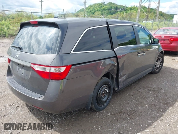2012 Honda Odyssey EX-L with VIN 5FNRL5H68CB060487, listed as a IAAI auction lot 42176223 with 234,078 mi miles and . Bid and sale history available at DreamBid. Image 4.
