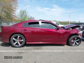 2019 Dodge Charger R/T z VIN 2C3CDXCTXKH573104, wystawiony jako IAAI lot #42126922 z przebiegiem 93 953 mil mil oraz . Historia ofert i sprzedaży dostępna na DreamBid. Obrazek 13.