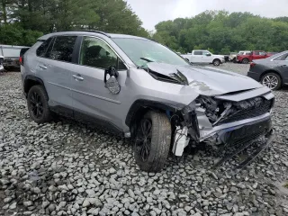 2023 Toyota RAV4 Hybrid SE with VIN JTM16RFV7PD100111, listed as a Copart auction lot 56682135 with 32,198 mi miles and Salvage title. Bid and sale history available at DreamBid. Image 1.