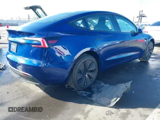 2025 Tesla Model 3 Long Range with VIN 5YJ3E1EA2SF915586, listed as a IAAI auction lot 41495870 with 4 mi miles and . Bid and sale history available at DreamBid. Image 4.