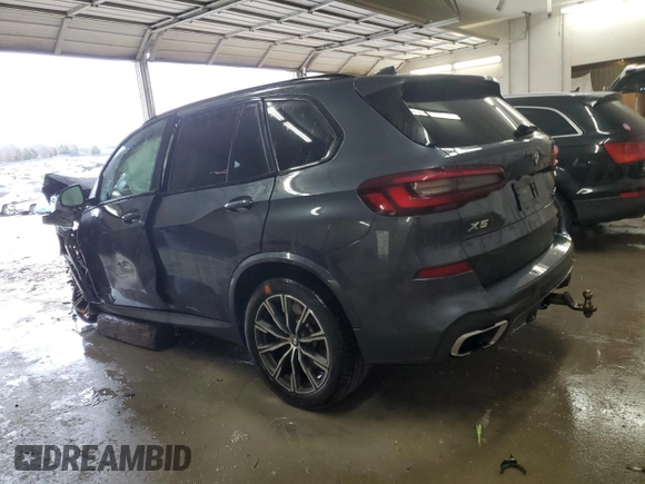 2021 BMW X5 xDrive45e with VIN 5UXTA6C07M9F68838, listed as a Copart auction lot 47763515 with 0 mi miles and Salvage Title. Bid and sale history available at carsss.com. Image 2.