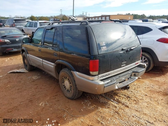 2000 GMC Jimmy SLE Convenience with VIN 1GKDT13W8Y2168245, listed as a IAAI auction lot 41348643 with 285,714 mi miles. Bid and sale history available at carsss.com. Image 3.