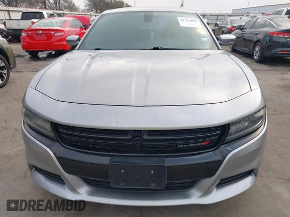 2015 Dodge Charger SXT with VIN 2C3CDXHG4FH884058, listed as a IAAI auction lot 41724894 with 202,701 mi miles and . Bid and sale history available at DreamBid. Image 13.