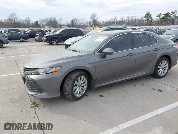 2019 Toyota Camry LE z VIN 4T1B11HK7KU759723, wystawiony jako IAAI lot #41679210 z przebiegiem 35 613 mil mil oraz . Historia ofert i sprzedaży dostępna na DreamBid. Obrazek 23.