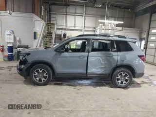 2022 Honda Passport TrailSport with VIN 5FNYF8H68NB003147, listed as a IAAI auction lot 41269006 with 61,026 mi miles and . Bid and sale history available at DreamBid. Image 6.
