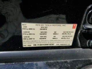 2017 Tesla Model S 100D with VIN 5YJSA1E28HF192397, listed as a Copart auction lot 55455995 with 90,534 mi miles and Salvage title. Bid and sale history available at DreamBid. Image 12.
