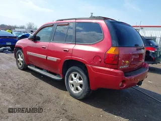 2005 GMC Envoy SLE with VIN 1GKDT13S252127604, listed as a IAAI auction lot 41898390 with 210,655 mi miles. Bid and sale history available at carsss.com. Image 3.