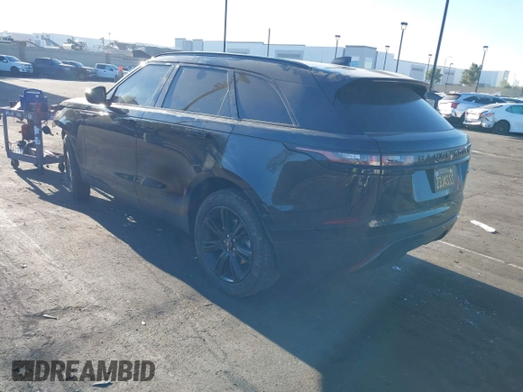 2023 Land Rover Range Rover Velar S z VIN SALYJ2EX5PA351243, wystawiony jako IAAI lot #42017735 z przebiegiem 13 748 mil mil oraz . Historia ofert i sprzedaży dostępna na DreamBid. Obrazek 3.