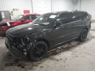 2015 Dodge Durango R/T with VIN 1C4SDJCT4FC888784, listed as a IAAI auction lot 41491247 with 192,206 mi miles and . Bid and sale history available at carsss.com. Image 2.
