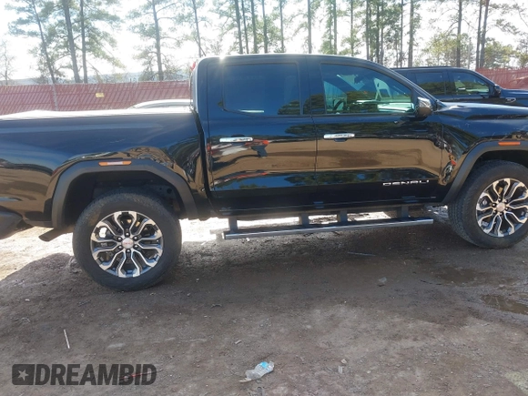 2023 GMC Canyon 4WD Denali with VIN 1GTP6FEK9P1146606, listed as a IAAI auction lot 41330983 with 18,907 mi miles and . Bid and sale history available at DreamBid. Image 13.