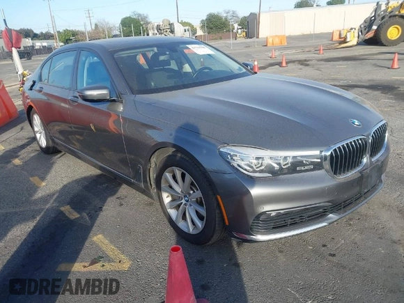 2018 BMW 7 Series 740i with VIN WBA7E2C55JB214987, listed as a IAAI auction lot 41733790 with 96,738 mi miles. Bid and sale history available at carsss.com. Image 1.