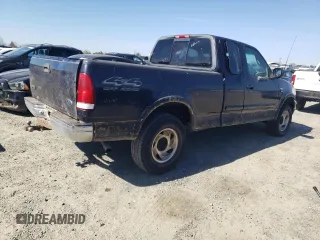 2000 Ford F-150 XL with VIN 1FTRX18W0YKB06899, listed as a Copart auction lot 46170175 with 252,042 mi miles and Salvage Title. Bid and sale history available at carsss.com. Image 3.