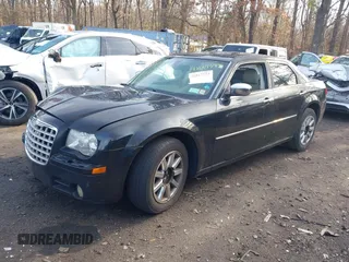 2009 Chrysler 300 Limited with VIN 2C3KA33V59H570460, listed as a IAAI auction lot 42017573 with 130,600 mi miles. Bid and sale history available at carsss.com. Image 2.