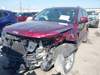 2017 Jeep Grand Cherokee Laredo with VIN 1C4RJEAG4HC674921, listed as a IAAI auction lot 41876971 with 115,773 mi miles. Bid and sale history available at carsss.com. Image 13.