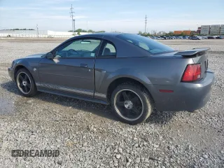 2004 Ford Mustang Standard with VIN 1FAFP40674F229138, listed as a Copart auction lot 56186445 with 128,566 mi miles and Salvage title. Bid and sale history available at DreamBid. Image 2.