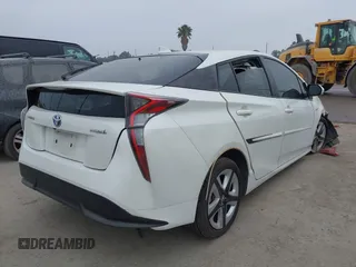 2016 Toyota Prius Four with VIN JTDKARFU4G3022953, listed as a IAAI auction lot 34510526 with Not provided miles and . Bid and sale history available at DreamBid. Image 4.