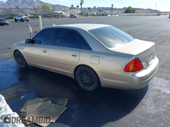 2001 Toyota Avalon XL w/Bucket Seats with VIN 4T1BF28BX1U117793, listed as a IAAI auction lot 42165172 with 247,435 mi miles. Bid and sale history available at carsss.com. Image 3.
