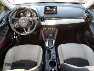 2018 Mazda CX-3 Grand Touring z VIN JM1DKFD79J0313779, wystawiony jako Copart lot #49120125 z przebiegiem 40 703 mil mil oraz Szkody całkowita. Historia ofert i sprzedaży dostępna na DreamBid. Obrazek 8.
