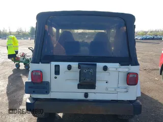 2002 Jeep Wrangler Sahara with VIN 1J4FA59S62P772256, listed as a IAAI auction lot 41968844 with 170,218 mi miles. Bid and sale history available at carsss.com. Image 16.