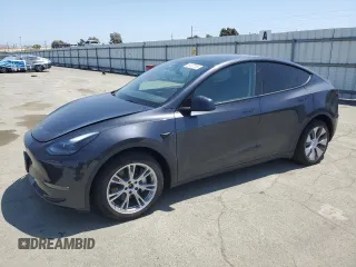 2024 Tesla Model Y Long Range z VIN 7SAYGDEE5RF060478, wystawiony jako Copart lot #55457785 z przebiegiem 11 864 mil mil oraz Szkoda całkowita • Salvage title. Historia ofert i sprzedaży dostępna na DreamBid. Obrazek 1.