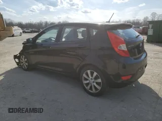 2012 Hyundai Accent SE with VIN KMHCU5AEXCU018278, listed as a Copart auction lot 48282465 with 106,970 mi miles and Salvage Title. Bid and sale history available at carsss.com. Image 2.