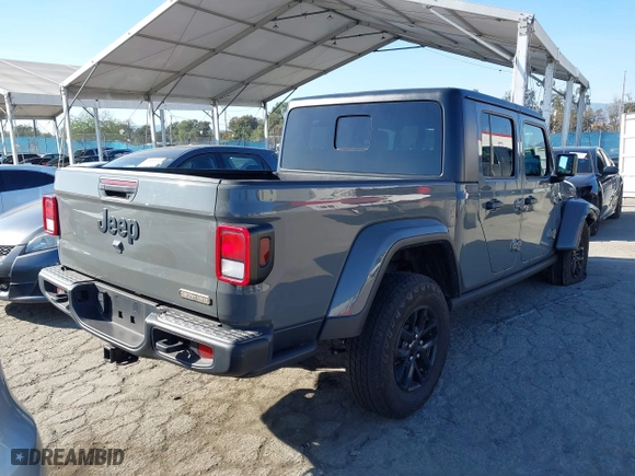 2023 Jeep Gladiator Freedom with VIN 1C6HJTAG9PL517097, listed as a IAAI auction lot 41860666 with 24,478 mi miles. Bid and sale history available at carsss.com. Image 4.