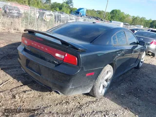 2014 Dodge Charger RT with VIN 2C3CDXCTXEH337797, listed as a IAAI auction lot 41964687 with 102,659 mi miles. Bid and sale history available at carsss.com. Image 4.