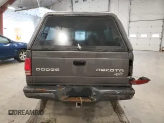 2003 Dodge Dakota z VIN 1D7GG16X23S204317, wystawiony jako Copart lot #54830745 z przebiegiem 139 508 mil mil oraz Szkoda całkowita • Salvage title. Historia ofert i sprzedaży dostępna na DreamBid. Obrazek 6.