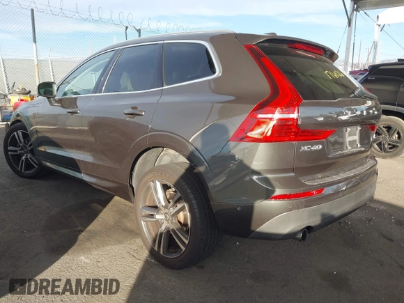 2019 Volvo XC60 Momentum with VIN LYV102RKXKB196748, listed as a IAAI auction lot 41261328 with 74,925 mi miles and . Bid and sale history available at DreamBid. Image 3.