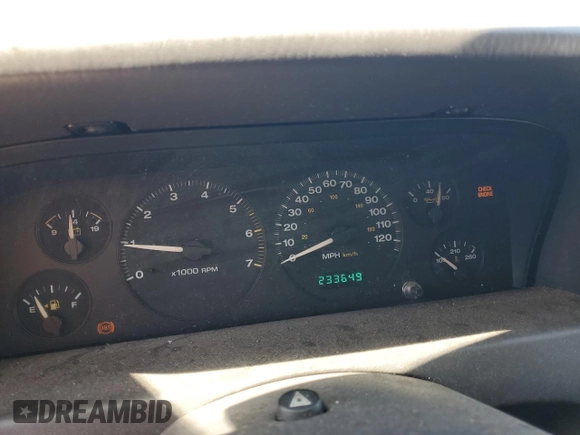 1999 Jeep Grand Cherokee Laredo z VIN 1J4G258SXXC518308, wystawiony jako Copart lot #56636235 z przebiegiem 233 649 mil mil oraz Szkoda całkowita • Salvage title. Historia ofert i sprzedaży dostępna na DreamBid. Obrazek 9.
