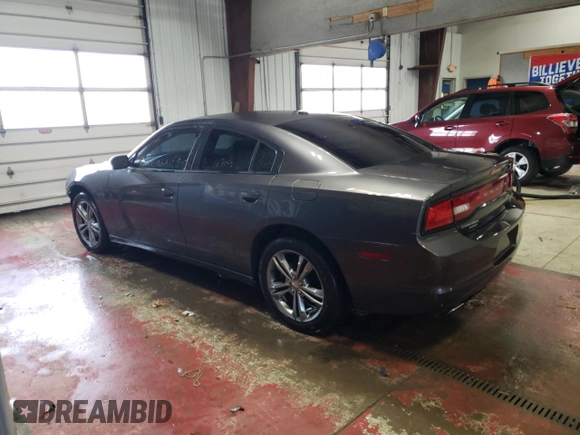 2014 Dodge Charger SXT with VIN 2C3CDXJG2EH211164, listed as a Copart auction lot 68972554 with 125,539 mi miles and Salvage Title. Bid and sale history available at carsss.com. Image 2.