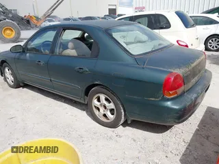 1999 Hyundai Sonata GLS with VIN KMHWF35V6XA107973, listed as a IAAI auction lot 42119318 with 174,231 mi miles. Bid and sale history available at carsss.com. Image 3.