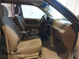 2000 Honda Passport LX z VIN 4S6DM58W1Y4406601, wystawiony jako IAAI lot #41632864 z przebiegiem 195 791 mil mil oraz . Historia ofert i sprzedaży dostępna na DreamBid. Obrazek 5.