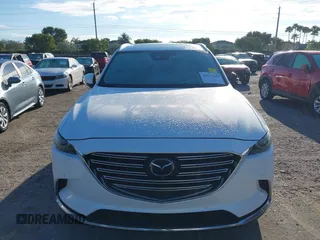 2019 Mazda CX-9 Grand Touring with VIN JM3TCADY3K0305173, listed as a IAAI auction lot 41672448 with 132,265 mi miles. Bid and sale history available at carsss.com. Image 6.