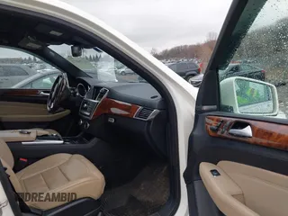 2014 Mercedes-Benz M 550 with VIN 4JGDA7DB1EA362659, listed as a IAAI auction lot 41704573 with 163,341 mi miles and . Bid and sale history available at carsss.com. Image 5.