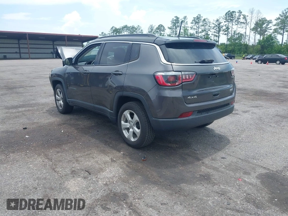 2018 Jeep Compass Latitude with VIN 3C4NJDBB6JT342520, listed as a IAAI auction lot 42464673 with 66,680 mi miles and . Bid and sale history available at DreamBid. Image 3.