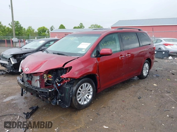 2015 Toyota Sienna XLE with VIN 5TDYK3DC9FS569714, listed as a IAAI auction lot 42297410 with 114,802 mi miles and . Bid and sale history available at DreamBid. Image 18.