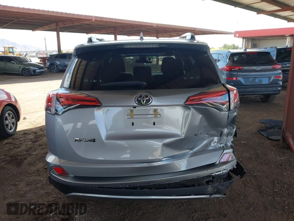 2018 Toyota RAV4 XLE with VIN 2T3WFREV5JW426314, listed as a IAAI auction lot 42075341 with 69,862 mi miles. Bid and sale history available at carsss.com. Image 16.