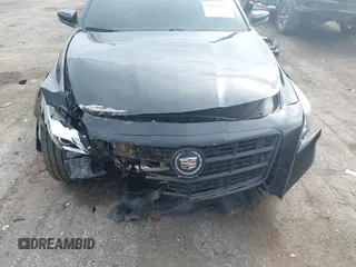 2014 Cadillac CTS Vsport Premium RWD z VIN 1G6AV5S8XE0143389, wystawiony jako IAAI lot #42021009 z przebiegiem 95 102 mil mil oraz . Historia ofert i sprzedaży dostępna na DreamBid. Obrazek 12.